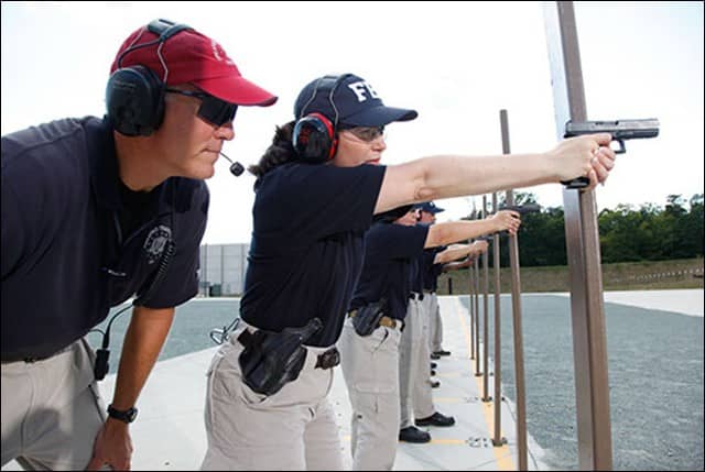 Female FBI Agent Practicing Shooting
