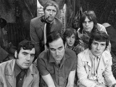 Monty Python 1969. Front (L-R): Terry Jones, John Cleese, Michael Palin. Back (L-R): Graham Chapman (deceased), Eric Idle, Terry Gilliam (American).