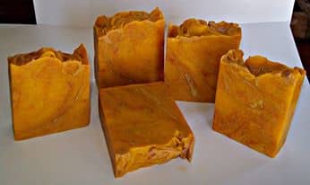 Red Palm Oil Soap swirled with Madder Root Powder, Red Clay, and Rose Clay. This batch was scented with a blend of Opium and Jasmine.
