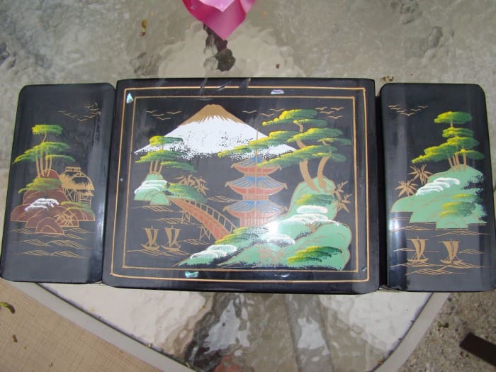 These made in the 1950s Black Lacquer Jewelry boxes are fun to collect and very easy to restore with a fresh coat of Lacquer they are good as new. Each one is like a remarkable time capsule .