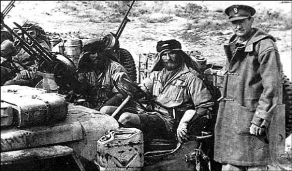 Colonel David Stirling, DSO, DFC, OBE (on the right, standing) had volunteered for No.8 Commando of Layforce under Brigadier Laycock and was the founder of British Special Forces and the SAS
