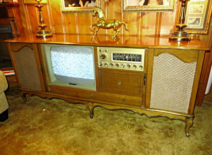 This console is over 55 years old this year 2015, and everything still works, the television, the FM & AM radio, and the Curtis Mathes made turntable.. A true timeless classic.