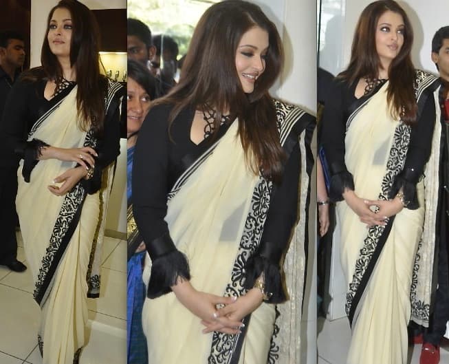 Here Aishwariya is wearing a saree during the time she gained weight post natal so as to not reveal her flabs around her stomach.