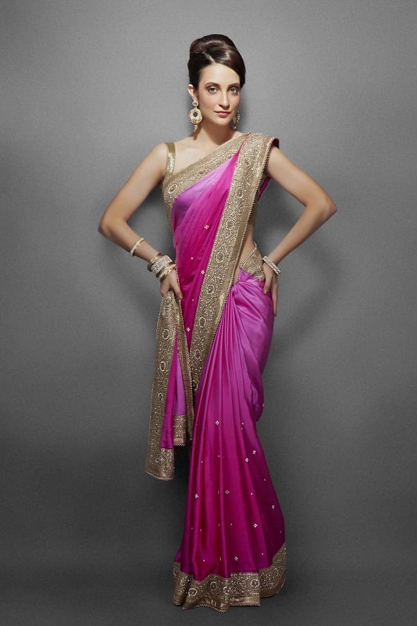 If the saree is to be worn nivi style and the pallu is pleated at the shoulder, it should be pleated narrow as shown in this picture.
