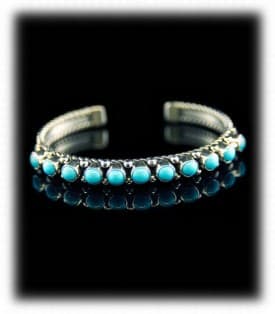 Navajo Turquoise Row Bracelet. Turquoise from Sleeping Beauty mine in Arizona. (Mine closed in 2012) Very classic bracelet made for decades.