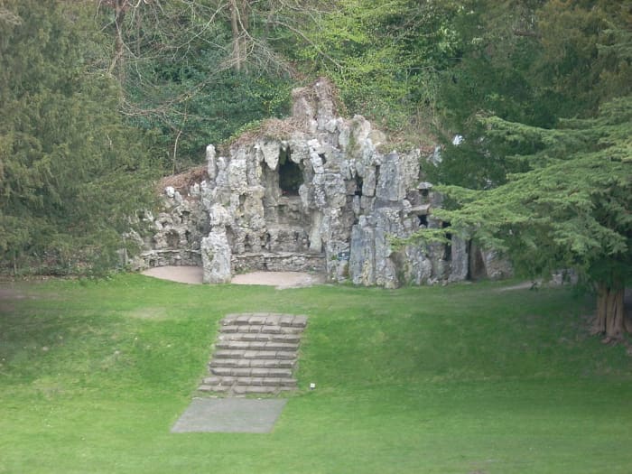 The Grotto of Old Wardour Castle was built in 1792 by Josiah Lane of Tisbury. He was commissioned to build the artificial cave, complete with dripping water, fossils and ferns from brick, plaster and stone from the ruins of the castle. The grotto als