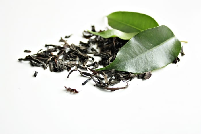 Green tea has been helping people relax for generations. Just make sure that the caffeine has been taken out!