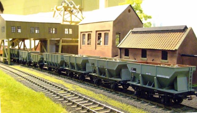 This is the fictional Greyscroft Mine, based on Cleveland (North Yorkshire), with a train of steel hoppers laden with real ironstone chippings.