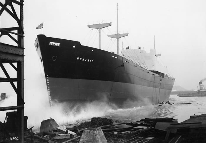 'Megantic' slides down the slipway into the river from the Swan Hunter shipyard on the south bank of the Tees in 1962.