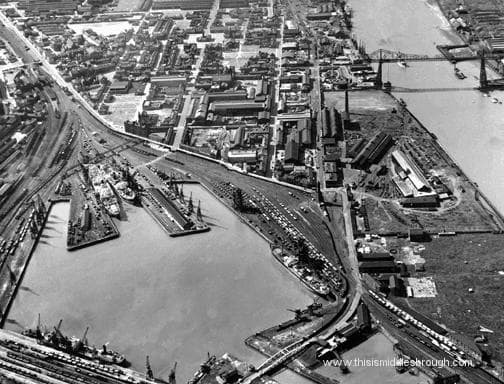 An aerial view of Middlesbrough Docks downriver of the Transporter Bridge (top right)