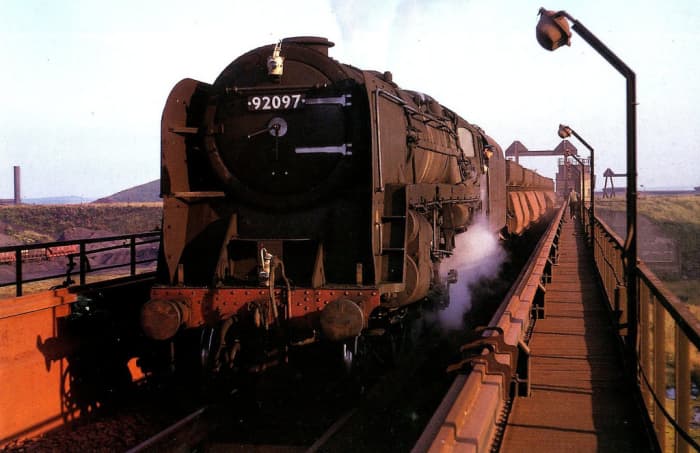 9F 92097 has brought a train of hoppers to the unloading terminal at Consett - as the song goes, "This could be the last time!"