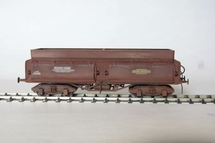 Dave Bradwell's 56 ton iron hopper kit is not cheap, and a full set of 8/9 will cost you an arm and a leg - go on, never mind the bank manager! But will your Hornby 9F be able to shift them?
