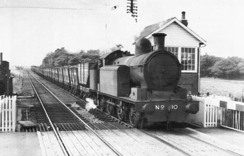 Lambton tank locomotive (0-6-2) No. 10 passes through Cox Green - west of Sunderland - with coal for export