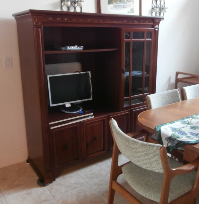 These chunky pieces of furniture fell out-of-favor when flat screen televisions no longer fit them. There are many other ways to use them.