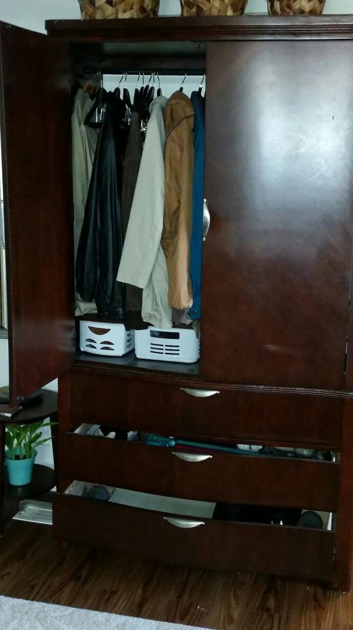 Add a clothes rod to the largest section of the unit. You can store mittens, mufflers and hats in the drawers. In this one, they keep exercise gear in the drawers.