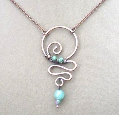 This necklace is a little more advanced, but in my opinion, once you learn how to work with wire, it would be fairly simple to make with the right supplies