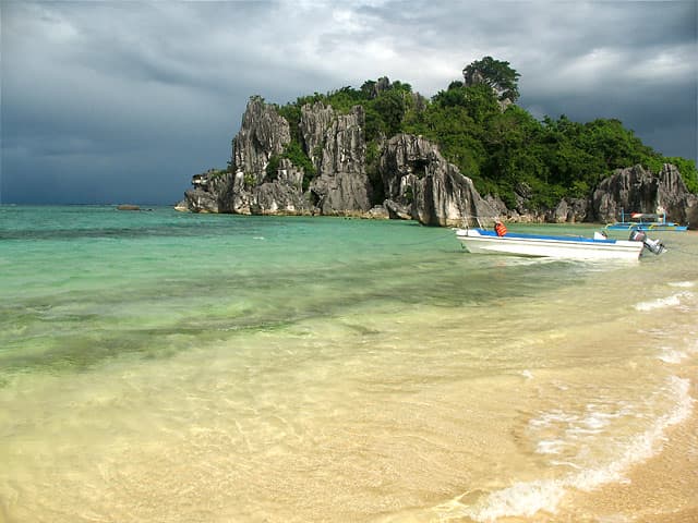 Sabitang-laya is a triangular shaped island in the Caramoan peninsula and is different from the other islands as it has twin beaches...