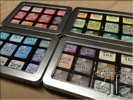 I love storing my distress inks in these handy containers made for them by Ranger, They fit in nicely and the lids stay put.