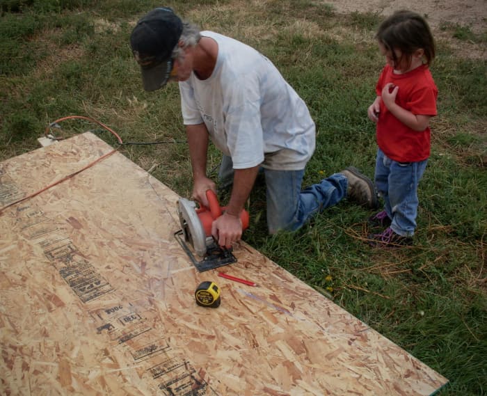 A circular saw with the blade set just deeper than the depth of the board works well for cutting the OSB.