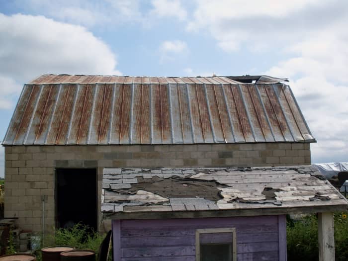 There were three sheets hanging down inside the barn toward the front end. Each of these old sheets was 2' wide.