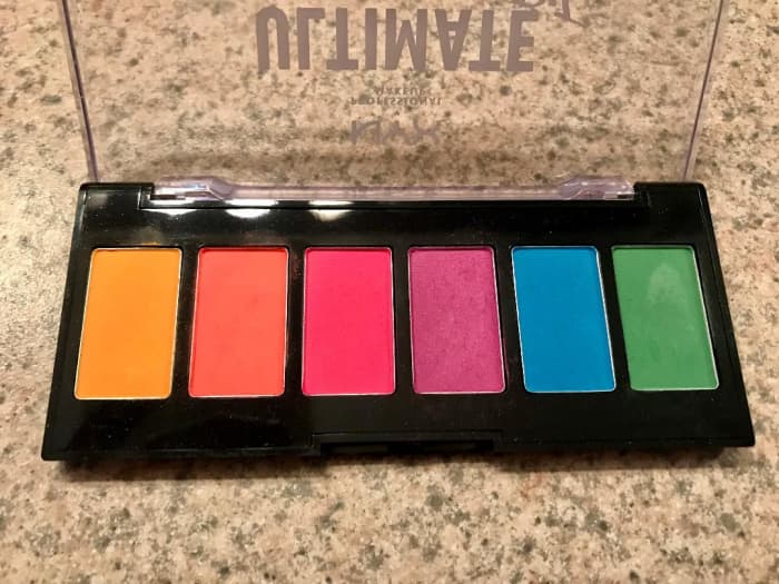 This is what the eye shadows look like in the pan. Top picture was taken without the flash and the bottom was taken with the flash.