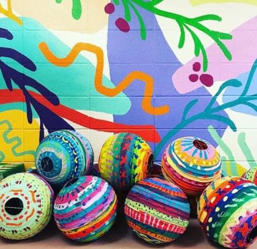 These pre-made paper lanterns from import stores are beautiful designs painted with acrylic craft paint.