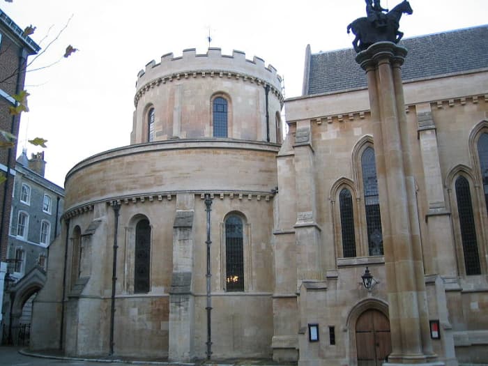 The outside of Temple Church in London, showing the view from the south, and the statute of the Knights Templar in the foreground