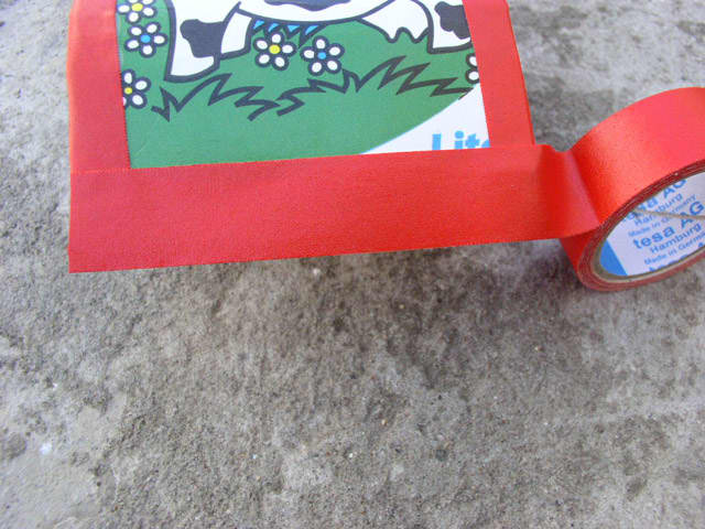 Putting a lot of tape all around the wallet looks good, but you also loose something of the original design.