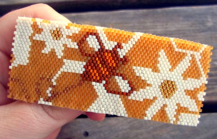 The same techniques used for a peyote stitch beaded cuff bracelet can also be used to create other jewelry and accessories like this barrette. This has a peyote face and felt backing for a smooth, durable finish.
