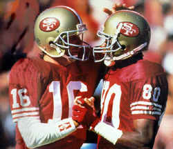 QB Joe Montana (right) and wide receiver Jerry Rice celebrate during Super Bowl XXIV against the Denver Broncos at the Superdome in New Orleans, Louisiana Jan 28,1990