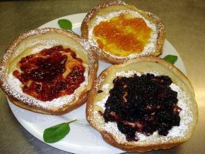I learned how to make Dutch baby pancakes in a baking class. We used preserves and powdered sugar as toppings.