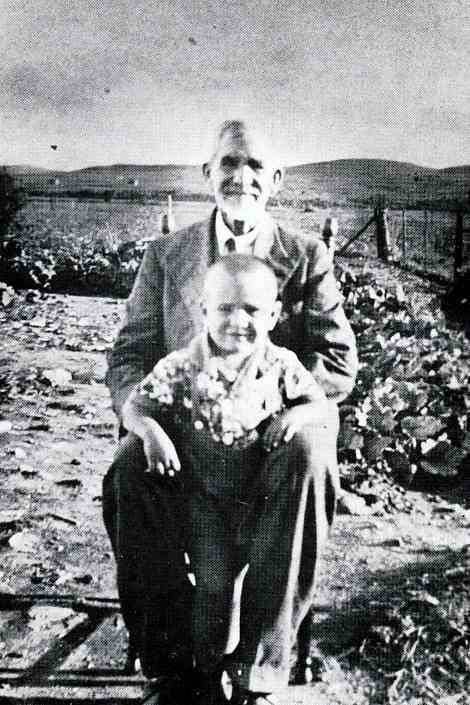 A very young Breyten Breytenbach with his father (I think?). Photo from "'n Seisoen in die Paradys." No caption in the book.
