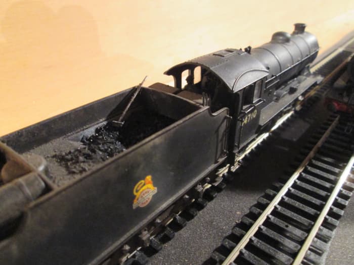Here's 64710 again in close-up with crew and an almost empty tender - shift-end? Looks like 64821 is outward bound to pick up her working
