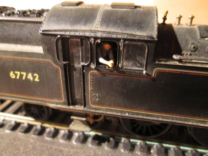 Thankfully the roof is removable, which makes it easier to add crew. Here the fireman leans out of the cab as the engine passes - coasting downhill