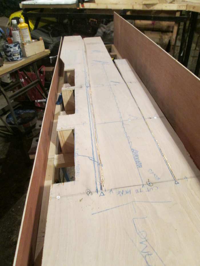 The back board is in place - at this stage screwed on - and the front one awaits 'profile' drawing' before it's cut. The cutouts have since been reduced to two, the nearest for lime cells (two hoppers) , the furthest for four hoppers (eight cells)