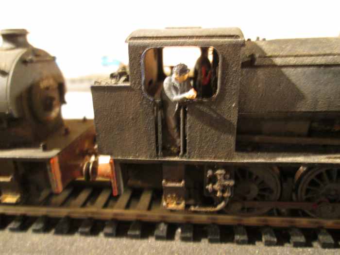 The fireman aboard an ex-WD Class 0-6-0 saddle tank (ST) J94 looks ahead for a signal at 'off' - hand-painted ModelU figure (I paint my own although the service is offered).