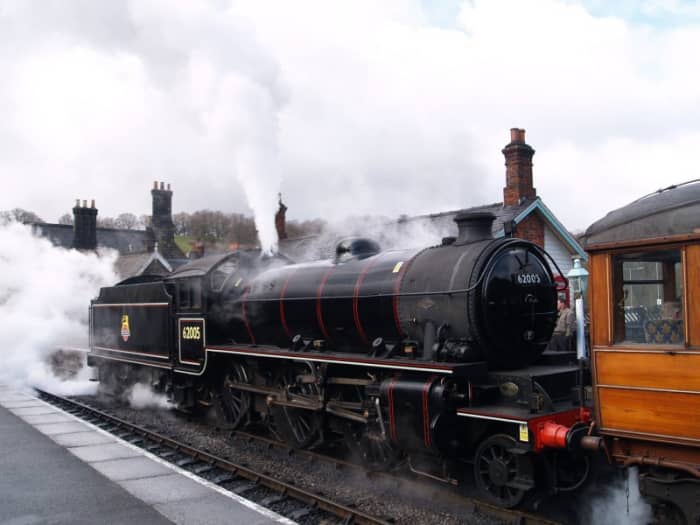 BR Lined mixed traffic livery K1 62005 in NELPG ownership at Grosmont heads a train of Gresley stock for Pickering - early BR 'cycling lion' totem