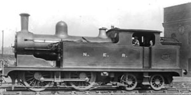 Class G5, originally North Eastern Railway class O No. 2087 on shed awaits permission from the 'bobby' (signalman) to join her train
