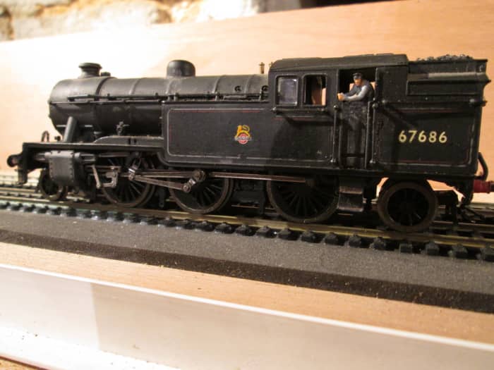 Sister V3 and shed-mate 67686 with hopper bunker is seen here, noses out for a local passenger working