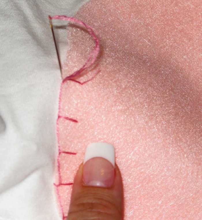 If you run out of thread, go back in where you just came out, and knot underneath. Start the new thread in the same spot.