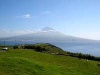 Mt. Pico, the Azores highest mountain rises above the island of the same name, as seen from Faial Island.