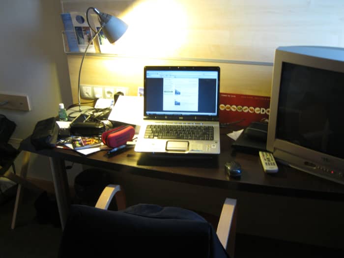 Desk in hotel room where I edited and published this before dawn in Barcelona while my wife slept a few feet away.