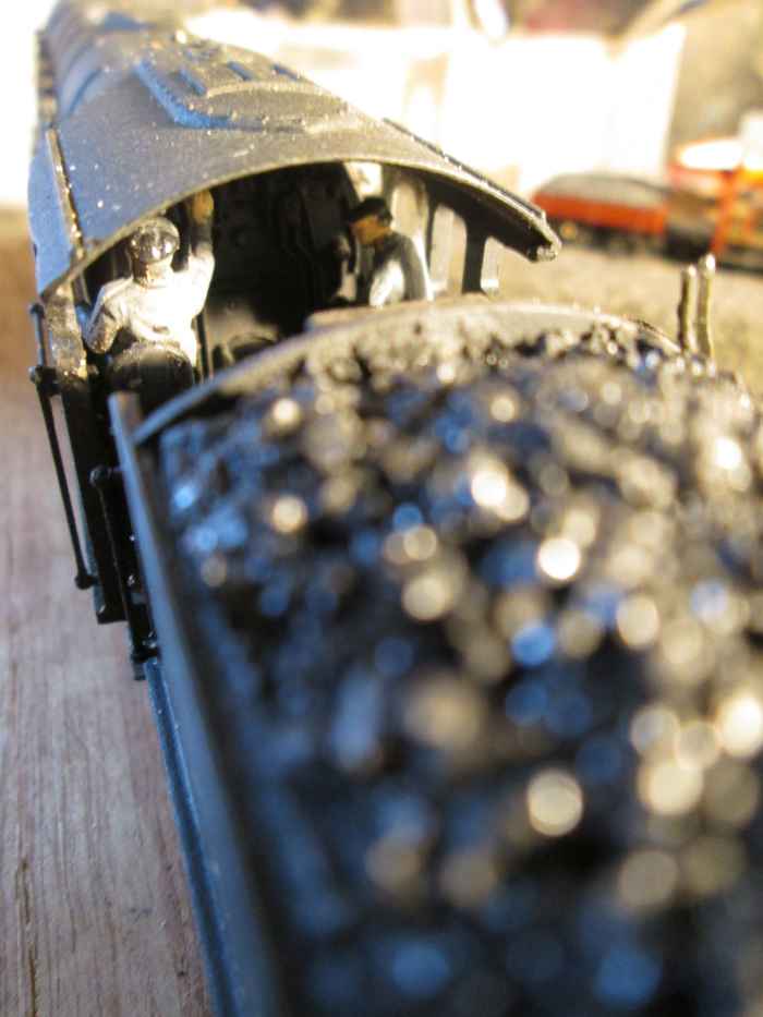 View over the front of the tender into the cab to show both ModelU crew seated (until the fire needs to be topped up)