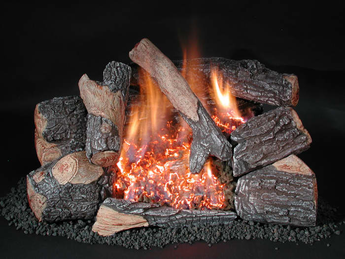 This is a ventless gas fireplace double burner. The visual difference is huge! Note the glowing embers that mark the second burner moving diagonally. Flames are not as tall as a single burner but there is more flame and light.