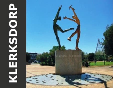 Klerksdorp - distinct statue representing the main economic resources of the region: The gold mining industry and agriculture