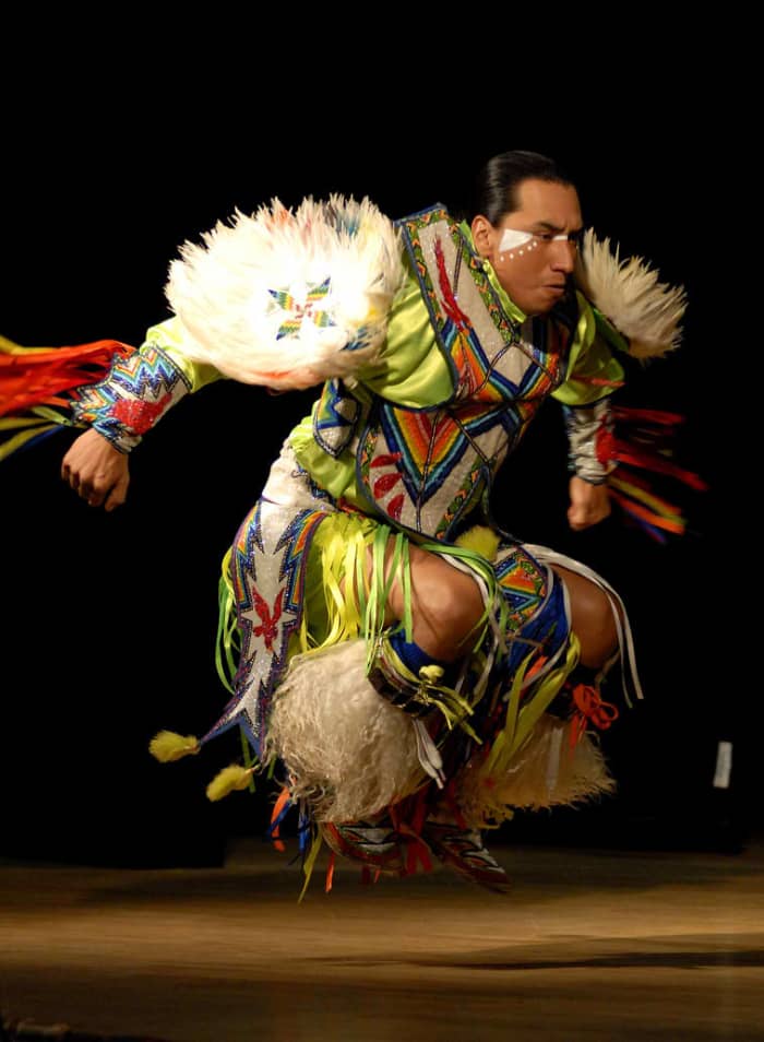 Larry Yazzie, with Native Pride Productions, entertains guests through tribal dance at Joint Base-Myer Henderson Hall in celebration of Native American Heritage Month. 11/20/09 The dancer is wearing regalia of the American Southwest.