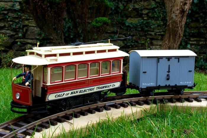 Bachmann Street Car as freelance line Calf of Man Electric Tramway (or COMET) and van on my Tempoary Garden Railway - David Lloyd-Jones 2010