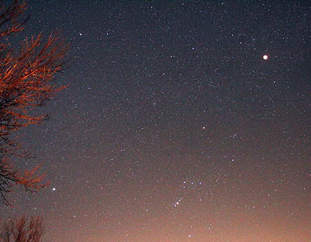 This time lapse photo clearly shows the 2010 winter solstice lunar eclipse in the Heart of Sky. The belt of Orion is clearly seen. The Heart of Sky is lined up directly above from the line extending through the three stars in Orion's sword.
