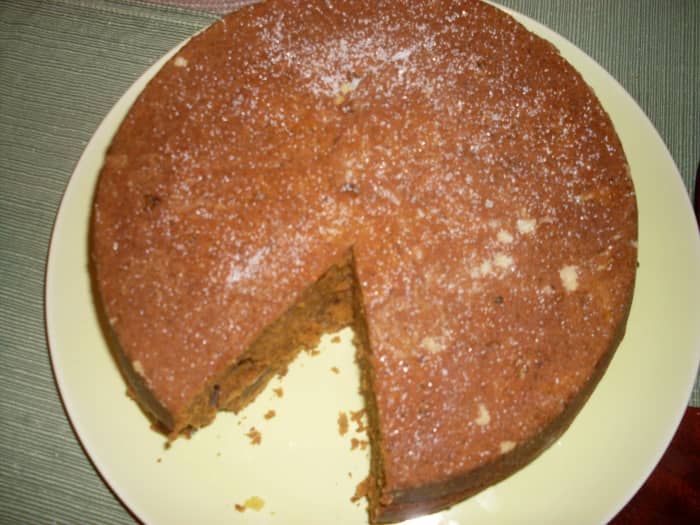 BEST PUMPKIN CAKE RECIPE photo: sugar sprinkled on top of delicious pumpkin cake