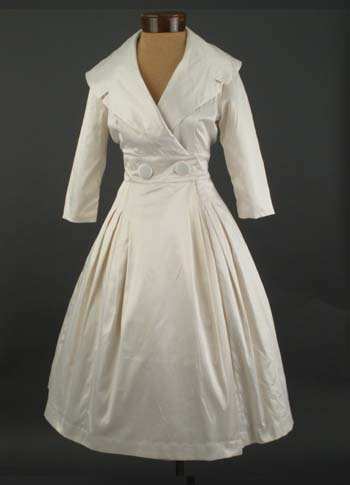 Stunning "Courtney" coat/dress from Trashy Diva Clothing, recreated for their Bridal Collection in a lustrous antique white satin finish cotton.